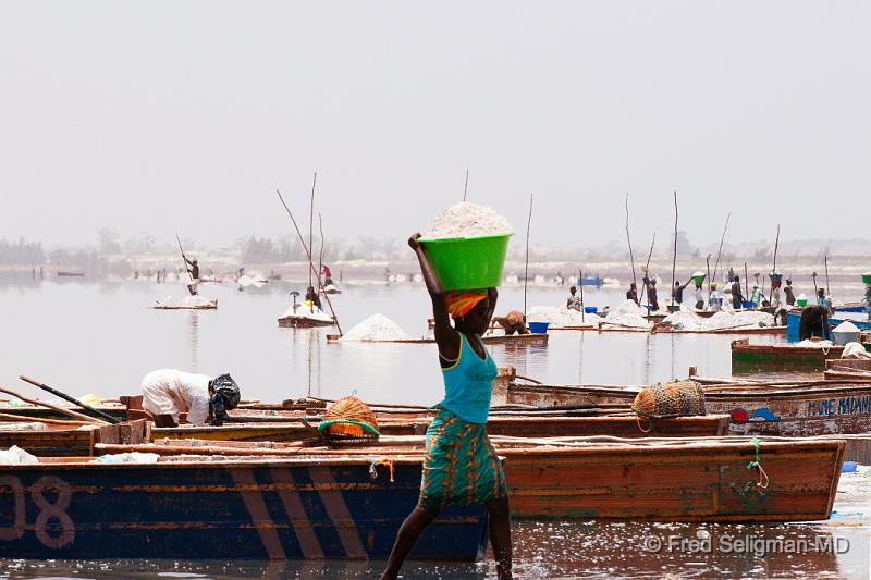 20090529_143616 D300 P2 S2.jpg - Lady carrying basin of salt, Pink Lake